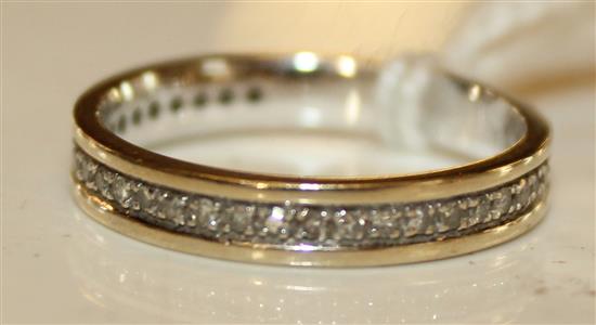 Diamond and white gold half-eternity ring